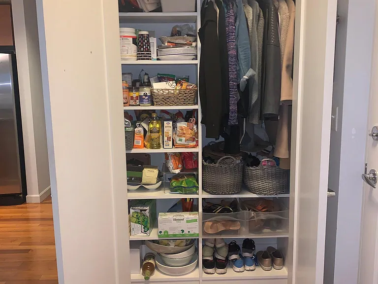 Entryway closet works great as pantry or extra storage space.