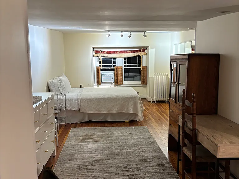 Large third floor bedroom with full bed