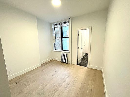 4th image of 233 E 5th St APT 8
