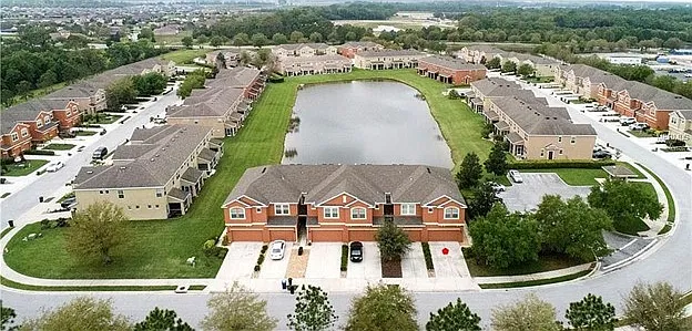 Aerial view of townhome and community