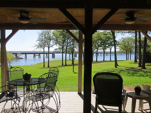 View of lake - covered deck