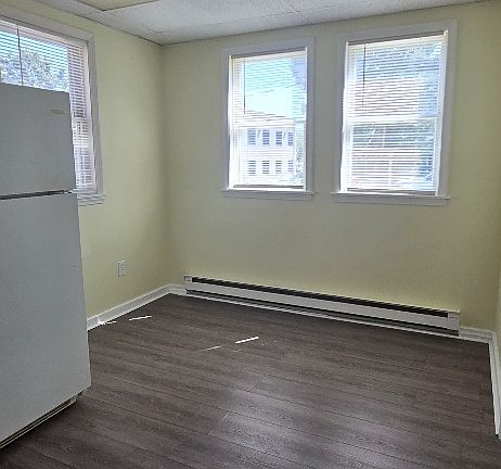 Second view of eating kitchen with beauitful window light.