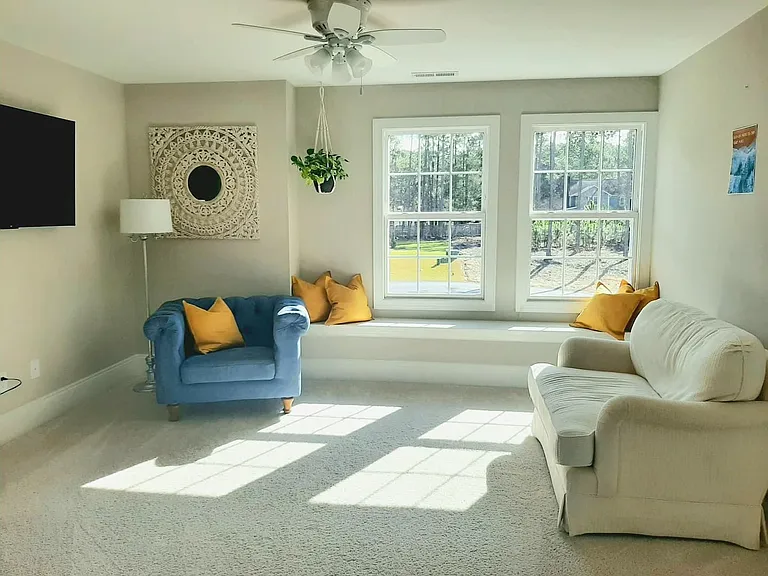 2nd story loft with bench seating.