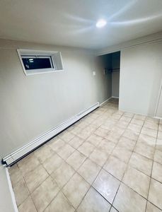 (Undisclosed Address), Roosevelt, NY, 11575