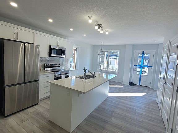 5th image of 64 Cityside Grv NE #M
