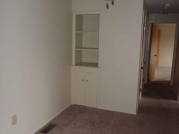 Like new carpet, built-ins, fan