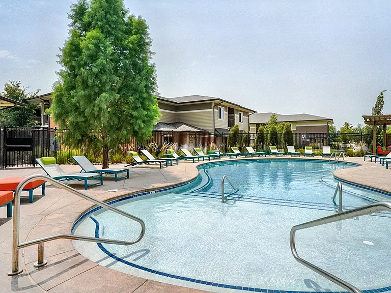 Dive into relaxation at our sparkling swimming pool.