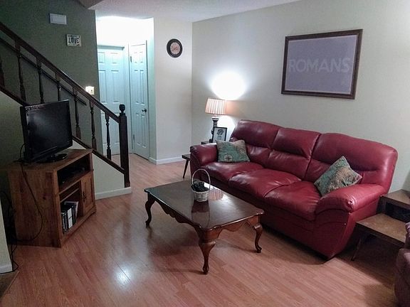 Living room facing bathroom