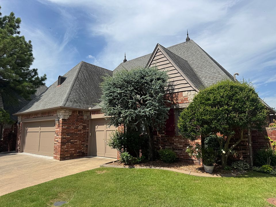 Private gated community home with 3 car garage, 2 private courtyards on a quiet street
