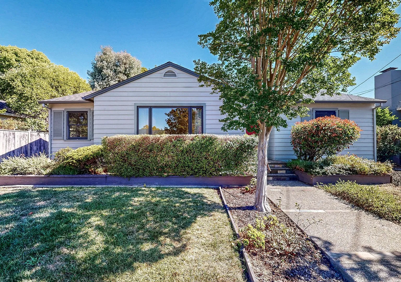 Bright & Cozy! Conveniently located Three Bedroom Two Bath Single Level with Detached Two Car Gar... — Photo 2