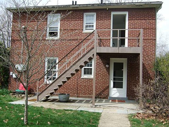 Rear entrance w/ upstairs landing. New large patio (not shown)