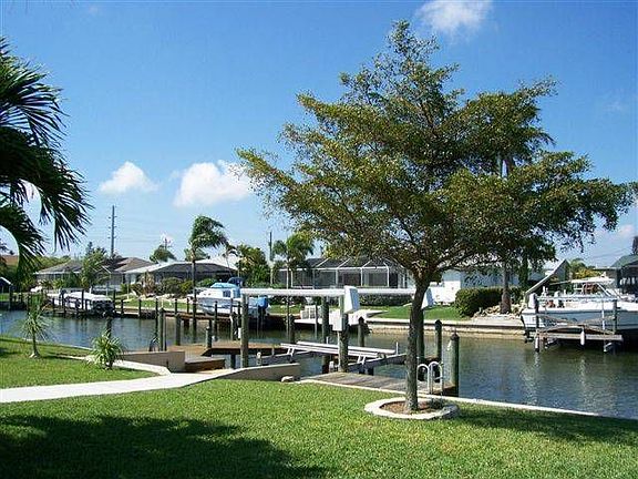 Back yard with boat dock & lift