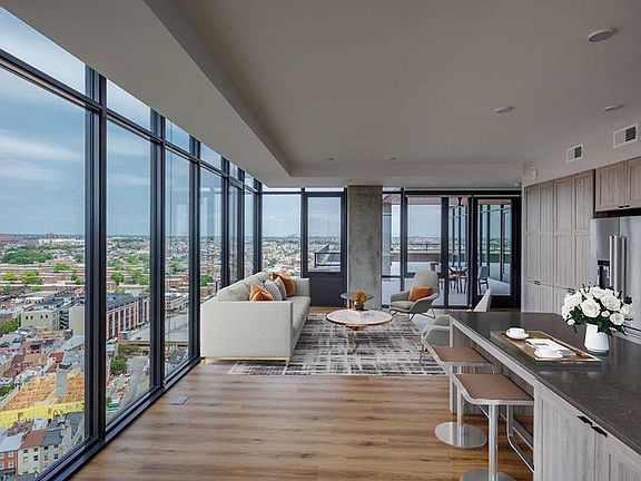 Penthouse-level Signature Collection apartment homes with floor-to-ceiling windows