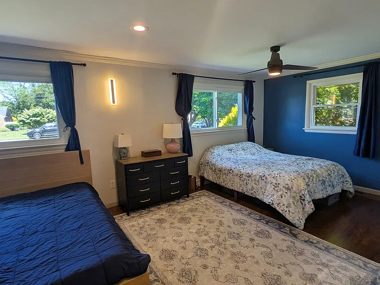 Large primary bedroom easily fits 2 queen beds with lots of room to spare