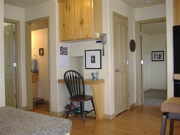 Bath off kitchen and desk