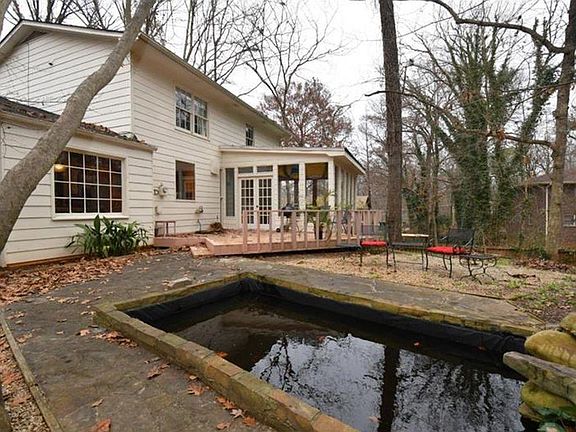 Backyard with deck & Koi pond