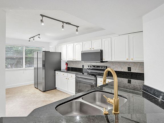 3rd image of 8761 Wiles Rd APT 301