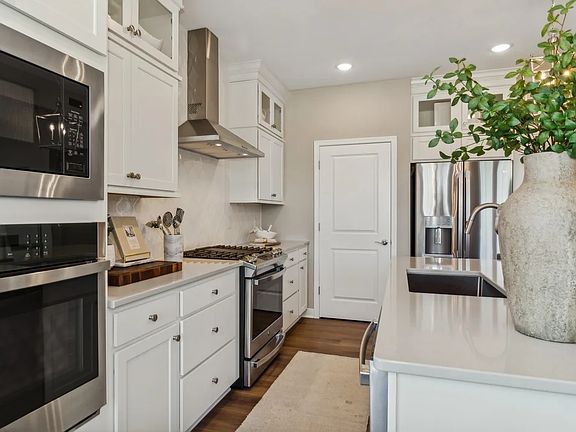 Kitchen with glass upper cabinets