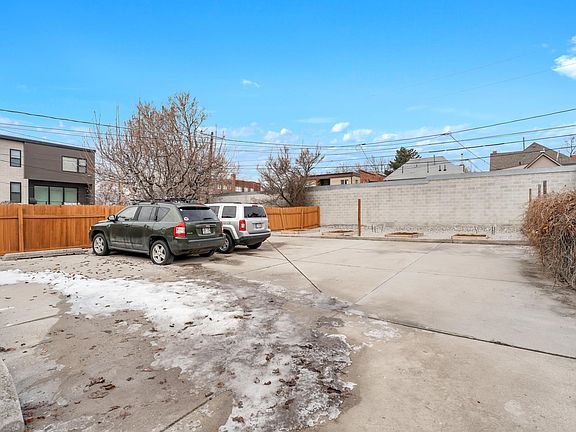 Two designated off-street parking spaces behind the house