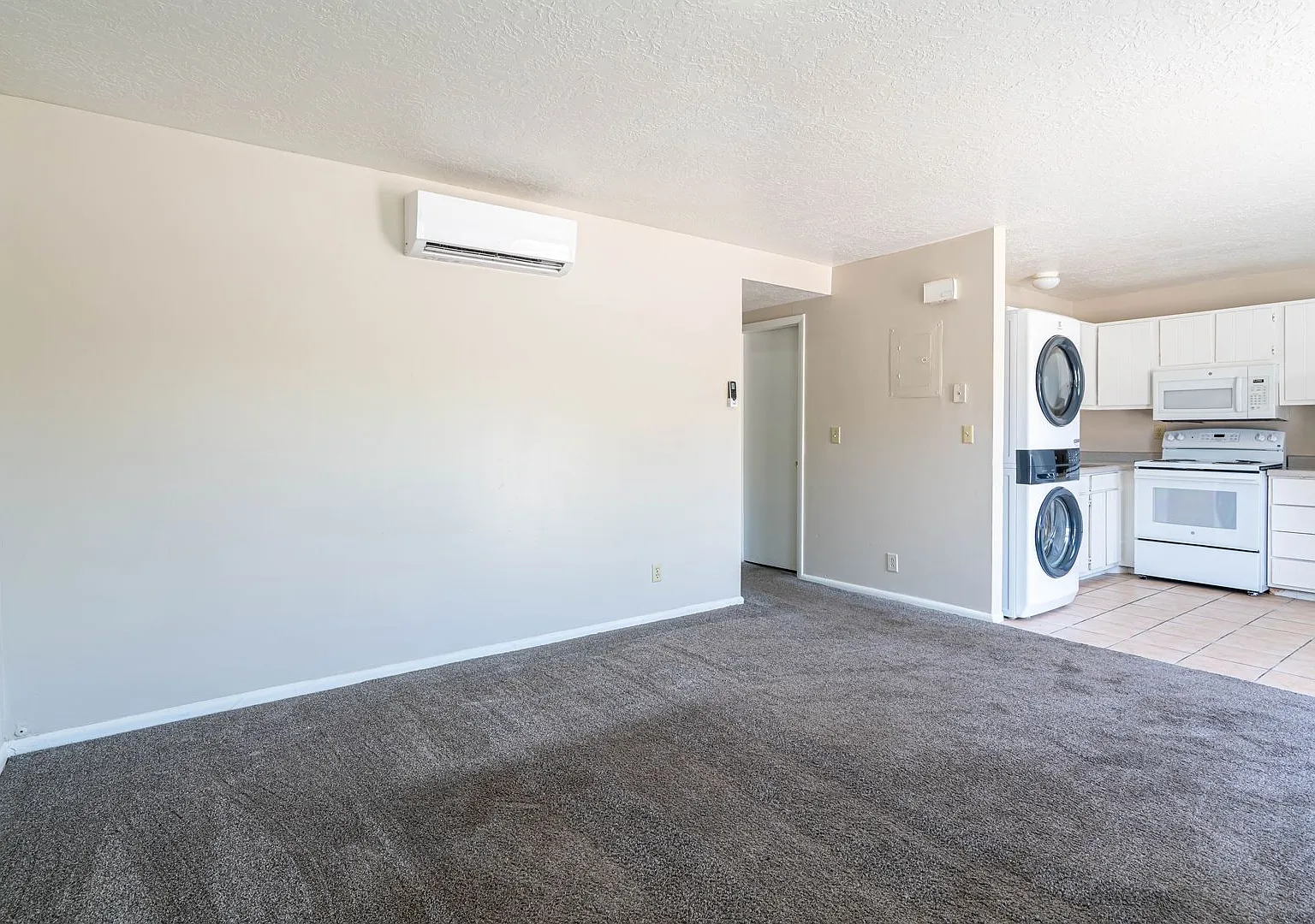 Bright and Spacious Living with In Unit Laundry and Natural Light — Photo 4