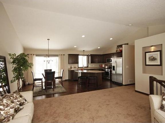 Many kitchen cabinets and center island.  All stainless appliance are included in the kitchen.