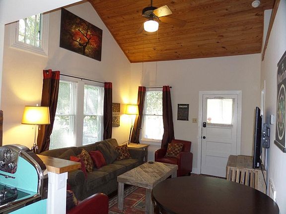 Living area with tall ceilings