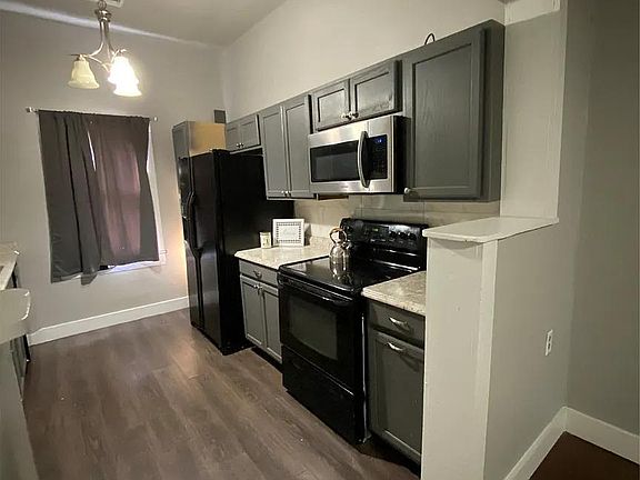 3rd image of 313 E 1st St