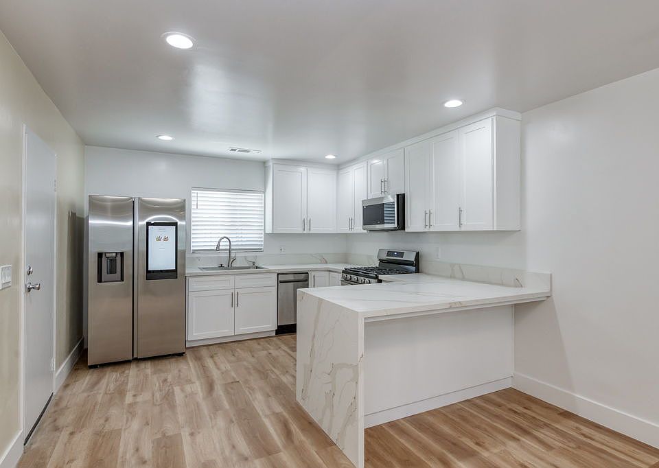 Luxury Kitchen & Appliances, LVP Flooring, Dual Pane Windows.