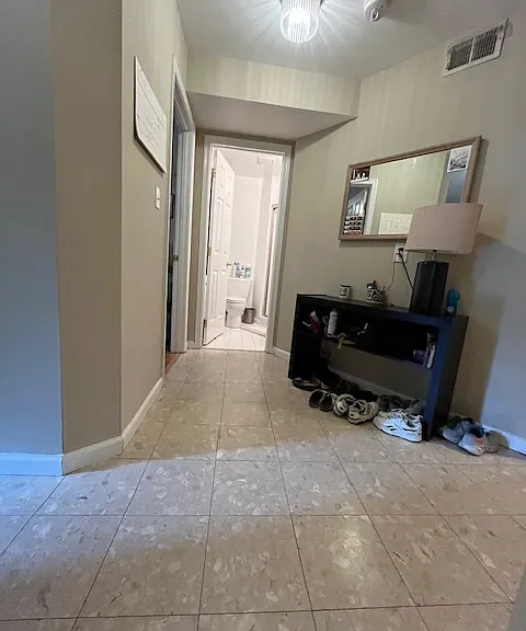 Entry foyer as you look left toward Bed & Bath #1