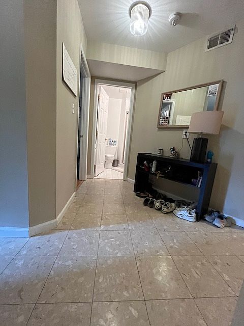 Entry foyer as you look left toward Bed & Bath #1
