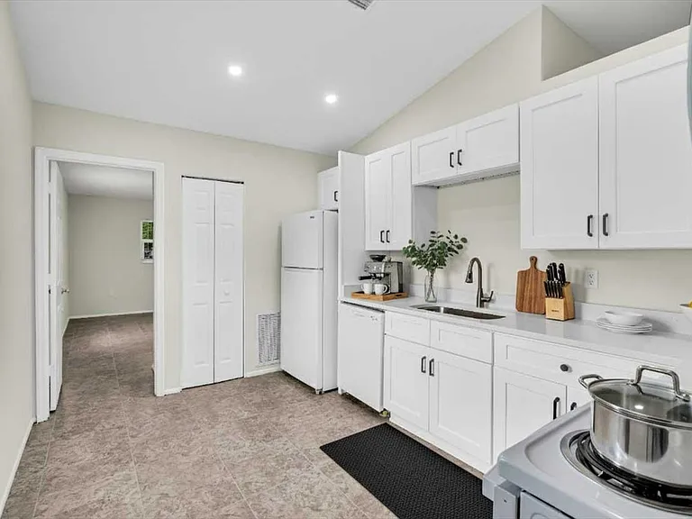 Updated cabinets, countertops, and appliances