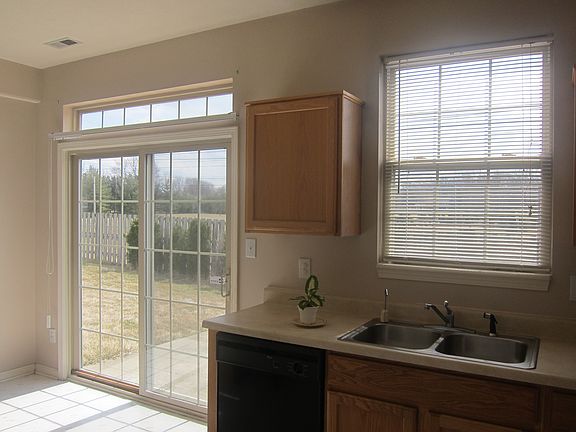 Backyard exit and Kitchen