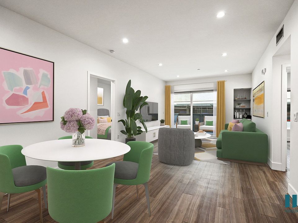 Dining and Living Room with Vinyl Flooring and Recessed Lighting