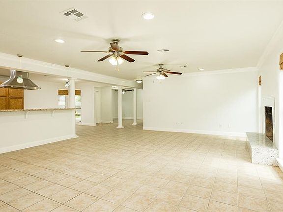 Custom colums grand entry way and open space makes this home look larger!