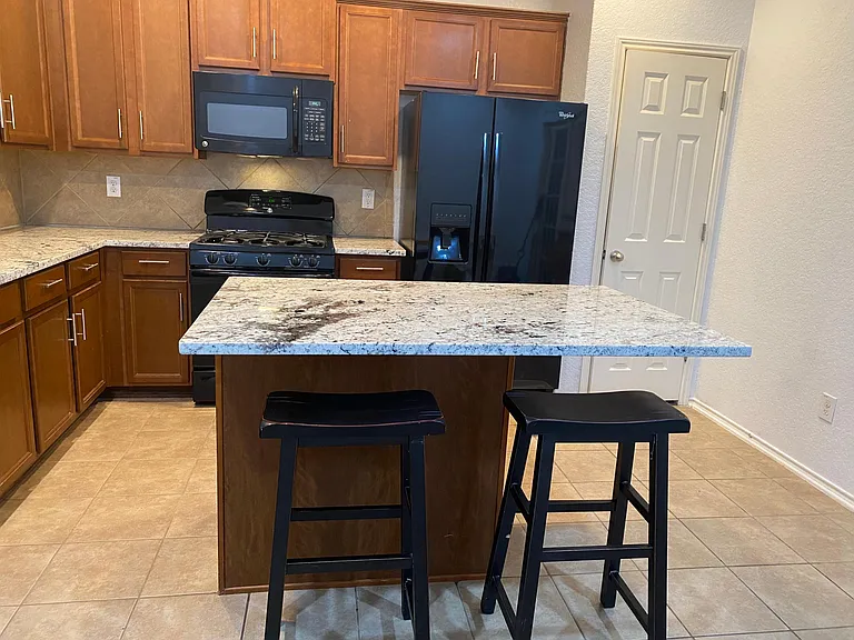 Kitchen can fit 4 bar stools