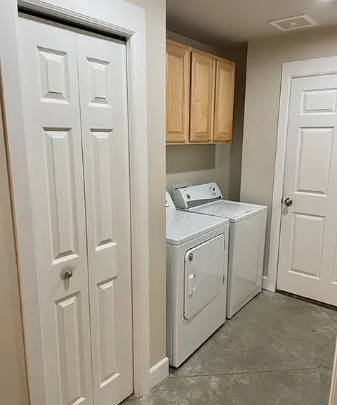Laundry, linen closet, garage entrance