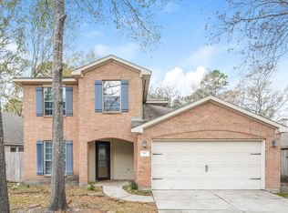 14 Rolling Ridge Ct, Conroe, TX 77385