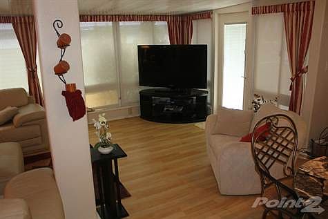 VIEW FROM FRONT ENTRANCE INTO LIVING ROOM