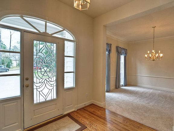 Leaded glass front door with side lights greet your visitors.