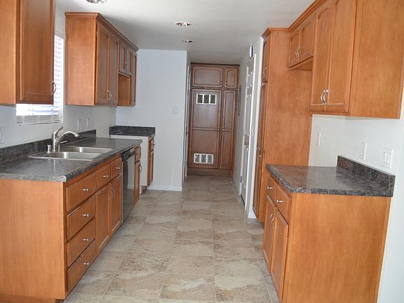 Kitchen, awaiting new range and microwave
