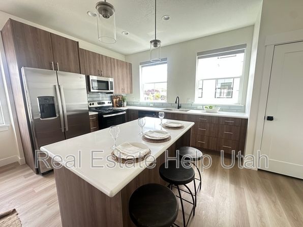 7846 S Holden St Unit 1B