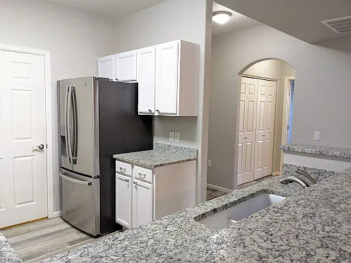 Another kitchen view and entrance foyer
