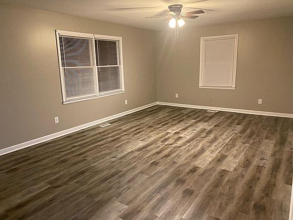 Large living room. New LVT hardwoods throughout home.