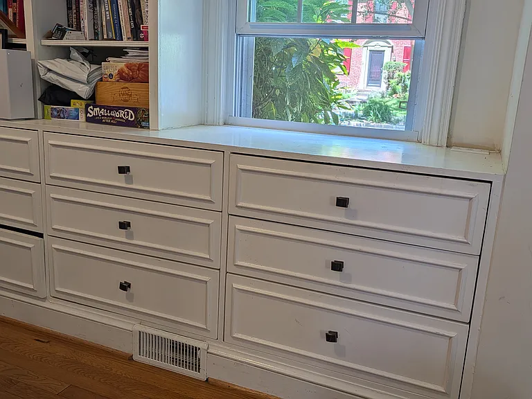 Close-up of built in drawers in dining room