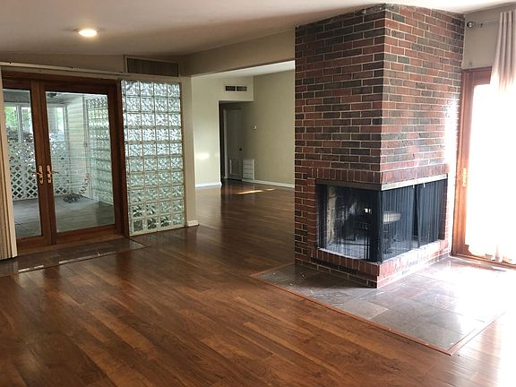 Wood Burning fire place. Doors to screened in porch
