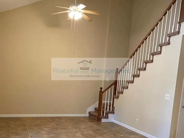 Living area and stairs to the upper level