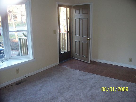 Sun filled living room with bay window