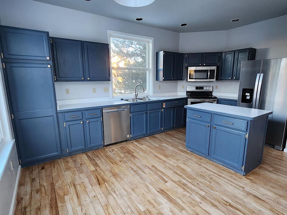 Kitchen cabinets with new paint and hardware