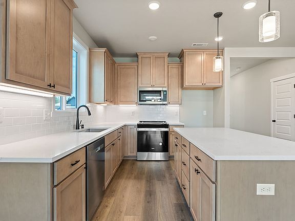 7110 S Holly ST by Aho Construction