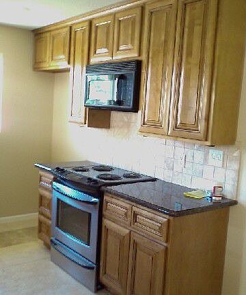 stainless appliances with solid granite tops